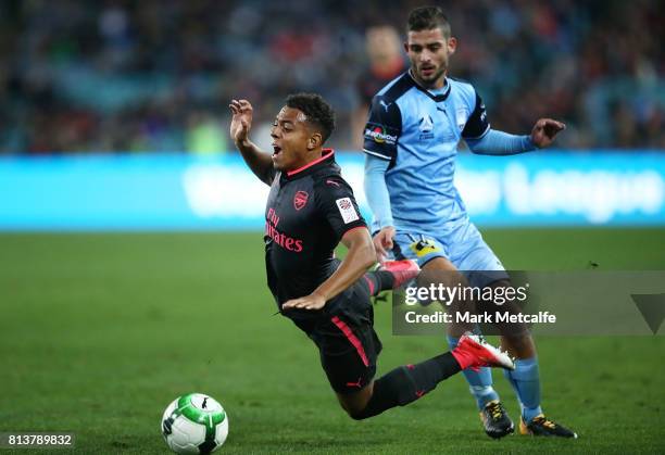 Donyell Malen of Arsenal is tackled during the match between Sydney FC and Arsenal FC at ANZ Stadium on July 13, 2017 in Sydney, Australia.