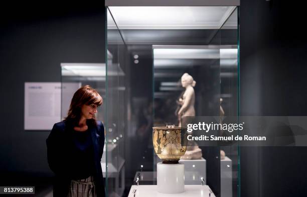 Visitor observes a sculpture during 'Agon! La Competicion En La Antigua Grecia ' Art Exhibition at Caixaforum Madrid on July 13, 2017 in Madrid,...