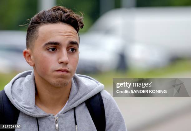 Ajax's Dutch midfielder Abdelhak Nouri arrives at the Ajax training compound for the first training of the new season in Amsterdam. - Abdelhak Nouri...