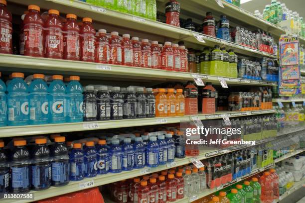 Shelves of sports drinks for sale in Winn-Dixie.