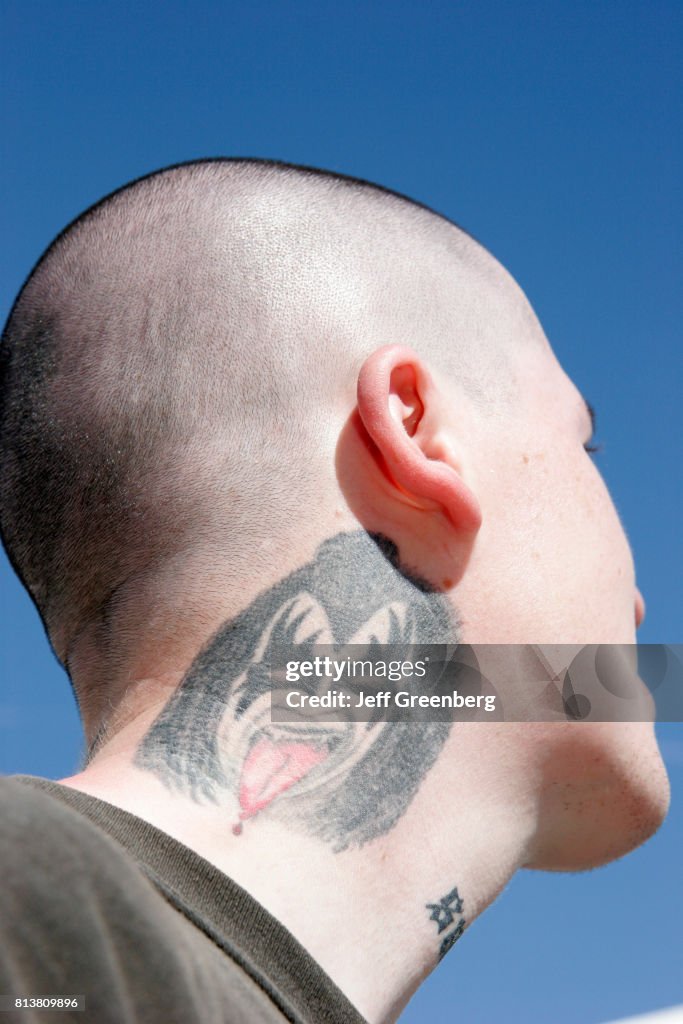 A Kiss fan with a tattoo on his neck