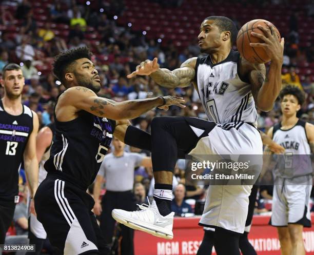 Gary Payton II of the Milwaukee Bucks drives to the basket against Frank Mason III of the Sacramento Kings during the 2017 Summer League at the...