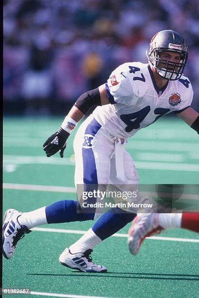 Tampa Bay Buccaneers safety John Lynch of the NFC runs in pursuit against the AFC in the 2000 NFL Pro Bowl at Aloha Stadium on February 6, 2000 in...