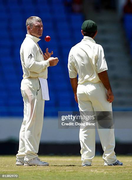Stuart MacGill, , and captain Ricky Ponting of Australia talk between overs on day five of the Second Test match between West Indies and Australia at...