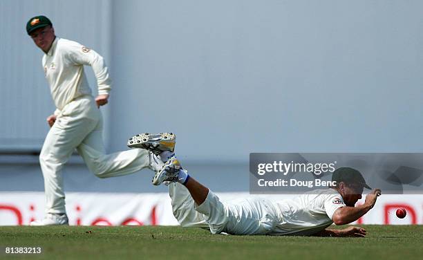 Phil Jaques of Australia knocks down a ball on day five of the Second Test match between West Indies and Australia at Sir Vivian Richards Stadium on...