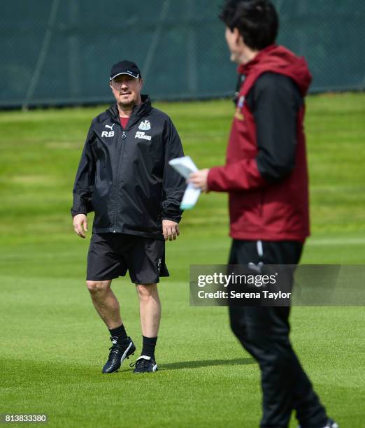 Newcastle United Manager Rafael Benitez looks at Newcastle United First Team Coach Mikel Antia during the Newcastle United Training session at the...