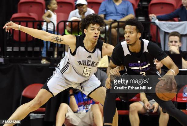 Wilson of the Milwaukee Bucks guards Skal Labissiere of the Sacramento Kings during the 2017 Summer League at the Thomas & Mack Center on July 12,...