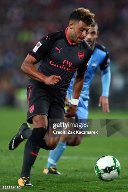 Alex Oxlade-Chamberlain of Arsenal controls the ball during the match between Sydney FC and Arsenal FC at ANZ Stadium on July 13, 2017 in Sydney,...