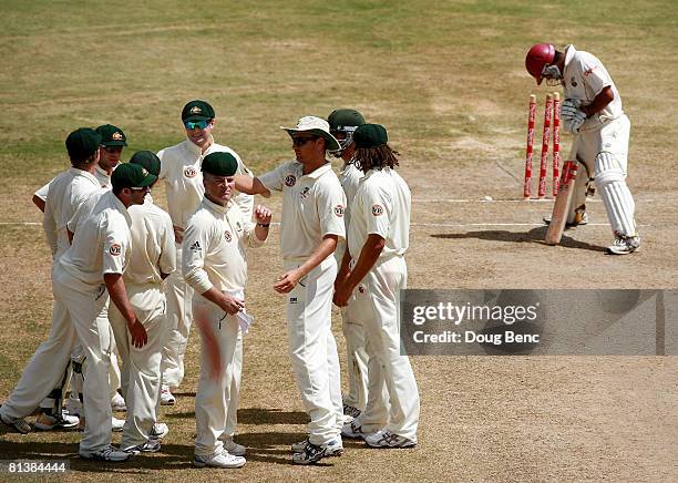 The Australian team and Ramnaresh Sarwan of West Indies waits in the crease during an appeal on day five of the Second Test match between West Indies...