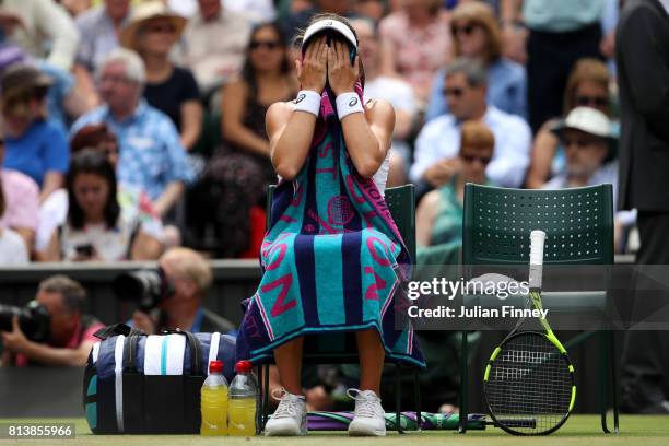 Johanna Konta of Great Britain reacts as she takes a break during the Ladies Singles semi final match against Venus Williams of The United States on...