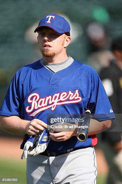 Chris Shelton of the Texas Rangers prepares for batting practice before the game against the Oakland Athletics at the McAfee Coliseum in Oakland,...