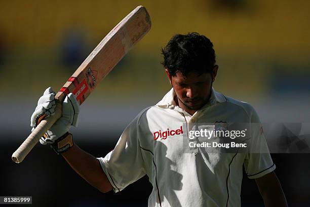 Ramnaresh Sarwan of West Indies raises his bat to acknowledge the crowd following his dismissal on day five of the Second Test match between West...