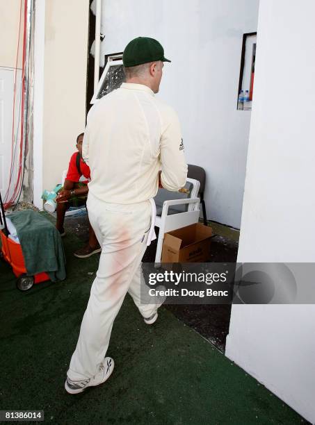 Stuart MacGill of Australia walks into the locker room after day five of the Second Test match between West Indies and Australia at Sir Vivian...