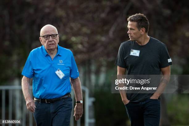 Rupert Murdoch, executive chairman of News Corp and chairman of Fox News, and Lachlan Murdoch, co-chairman of 21st Century Fox, walk together as they...