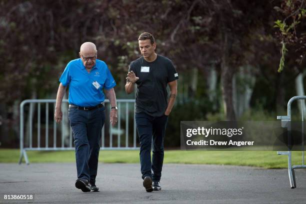 Rupert Murdoch, executive chairman of News Corp and chairman of Fox News, and Lachlan Murdoch, co-chairman of 21st Century Fox, walk together as they...