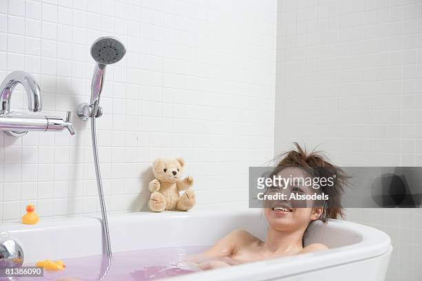 young woman talking bath - japanese women bath stock-fotos und bilder