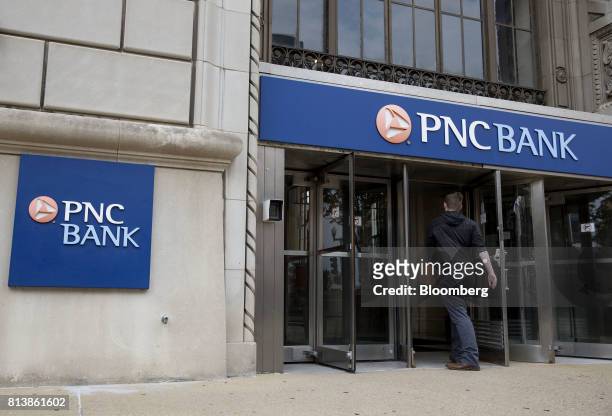 Customer enters a PNC Financial Services Group Inc. Bank branch in Peoria, Illinois, U.S., on Monday, July 10, 2017. PNC Financial Services Group...