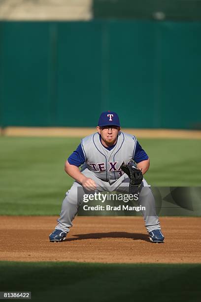 Chris Shelton of the Texas Rangers fields during the game against the Oakland Athletics at the McAfee Coliseum in Oakland, California on May 3, 2008....