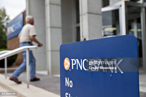 Customer enters a PNC Financial Services Group Inc. Bank branch in Morton, Illinois, U.S., on Monday, July 10, 2017. PNC Financial Services Group...