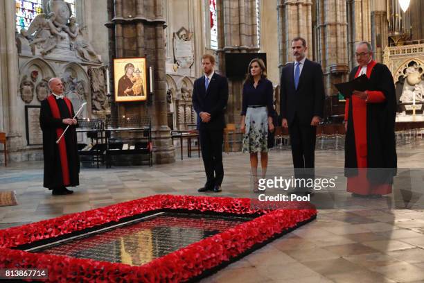 Prince Harry, Queen Letizia of Spain, King Felipe of Spain and the Dean of Westminster Dr John Hall stand beside the grave of the Unknown Warrior at...