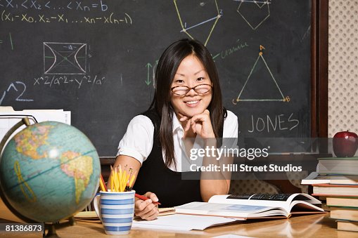 Asian Math Setup Asian Female Math Teacher At Desk High-Res Stock Photo - Getty Images