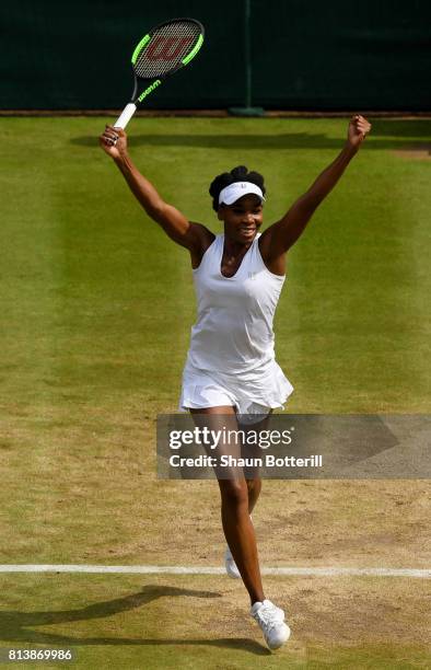 Venus Williams of The United States celebrates match point and victory during the Ladies Singles semi final match against Johanna Konta of Great...