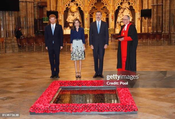 Prince Harry, Queen Letizia of Spain, King Felipe of Spain and the Dean of Westminster Dr John Hall stand beside the grave of the Unknown Warrior...