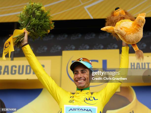 Fabio Aru of Italy riding for Astana Pro Team celebrates winning the yellow jersey after stage 12 of the Le Tour de France 2017, a 214.5km stage from...