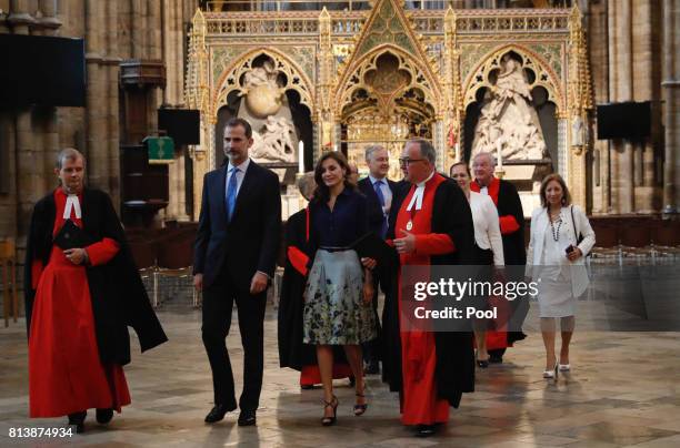 King Felipe of Spain and Queen Letizia of Spain walk through the nave with Dean of Westminster Dr John Hall during a State visit by the King and...