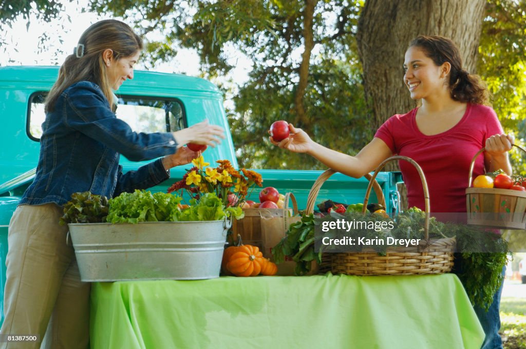 Hispanic women at organic farm stand