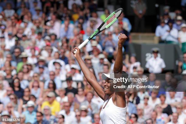 Player Venus Williams reacts after winning against Britain's Johanna Konta during their women's singles semi-final match on the tenth day of the 2017...