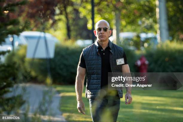 Jeff Bezos, chief executive officer of Amazon, arrives for the third day of the annual Allen & Company Sun Valley Conference, July 13, 2017 in Sun...