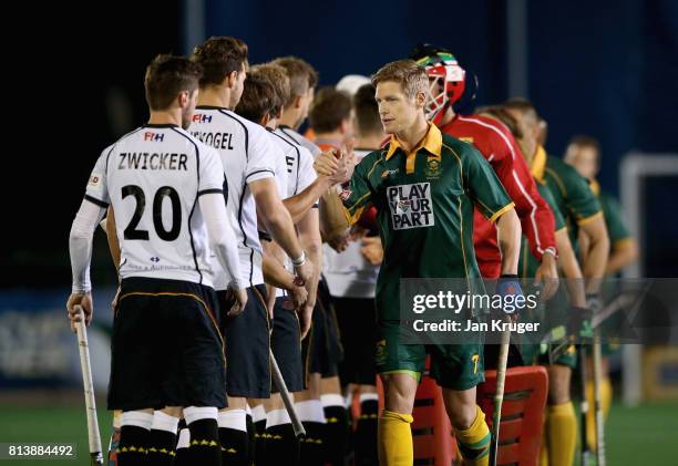 South Africa players and ger players shake hands prior to the day 3 of the FIH Hockey World League Semi Finals Pool B match between South Africa and...