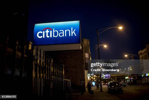 Citigroup Inc. Signage is seen illuminated outside a bank branch in Chicago, Illinois, U.S., on Wednesday, July 12, 2017. Citigroup Inc. Is scheduled...