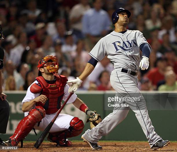 Carlos Pena of the Tampa Bay Rays hits a two run homer in the sixth inning as Jason Varitek of the Boston Red Sox catches on June 3, 2008 at Fenway...