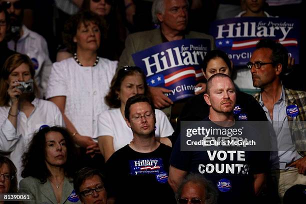 Clinton supporters listen during Democratic presidential hopeful U.S. Sen. Hillary Clinton's speech at Baruch College June 3, 2008 in New York City....