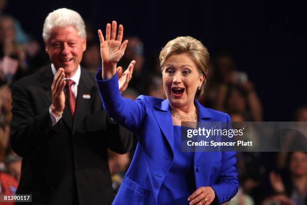 Democratic presidential candidate Hillary Clinton and her husband, former President Bill Clinton, greet supporters June 3, 2008 in New York City....