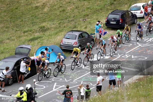 The peloton pass fans during stage 12 of the Le Tour de France 2017, a 214.5km stage from Pau to Peyragudes on July 13, 2017 in Pau, France.