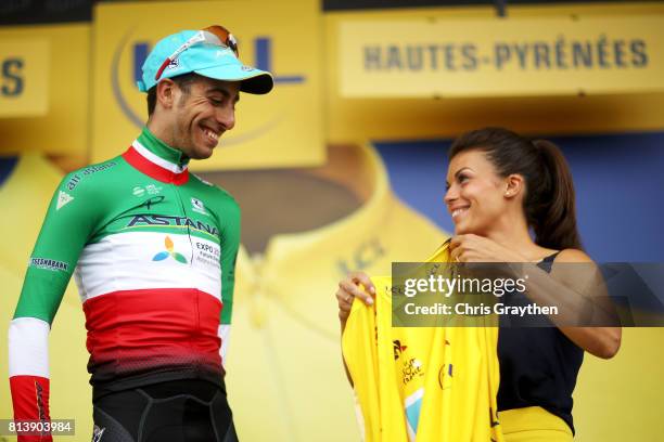 Fabio Aru of Italy riding for Astana Pro Team poses for a photo on the podium after taking the leader's jersey during stage 12 of the 2017 Le Tour de...