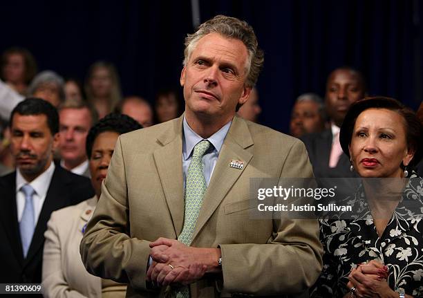 Terry McAuliffe, campaign chairman for Democratic presidential hopeful Hillary Clinton, looks on as Clinton speaks to supporters at the final primary...