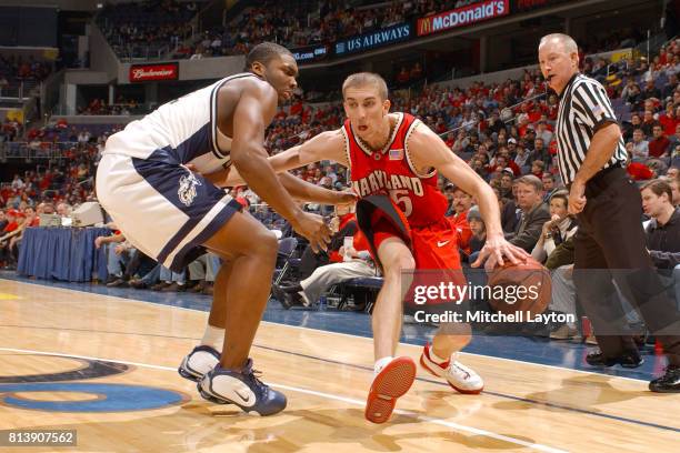 Steve Blake of the Maryland Terrapins dribbles the ball during the BBT Classic college basketball game against the George Washington Colonials at MCI...