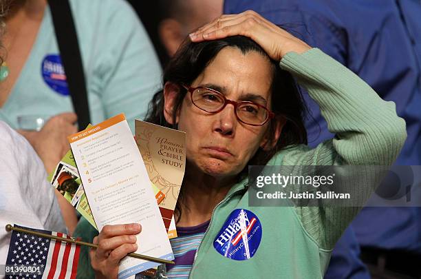 Supporter of Democratic presidential hopeful Hillary Clinton holds her head during the final primary night party June 3, 2008 at Baruch College in...
