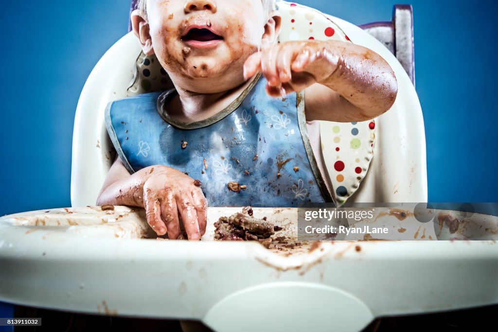 Cute Messy Baby Covered in Food