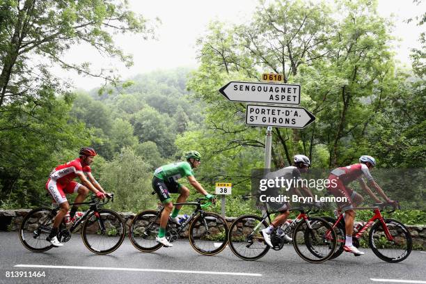 The peloton pass a road sign during stage 12 of the Le Tour de France 2017, a 214.5km stage from Pau to Peyragudes on July 13, 2017 in Pau, France.