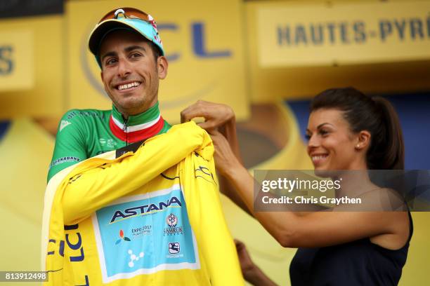 Fabio Aru of Italy riding for Astana Pro Team poses for a photo on the podium after taking the leader's jersey during stage 12 of the 2017 Le Tour de...