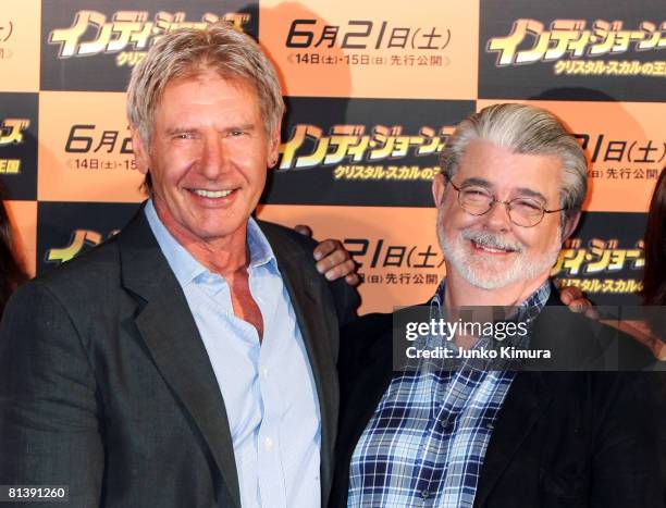 Actor Harrison Ford and excutive producer and writer George Lucas pose during a photocall promoting "Indiana Jones and the Kingdom of the Crystal...
