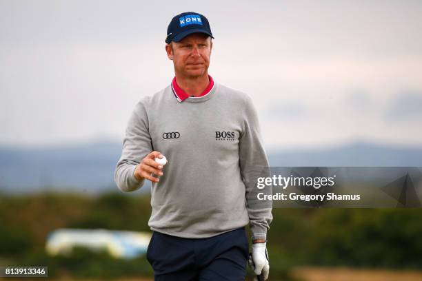 Mikko Ilonen of Finland acknowledges the crowd on the 7th green during day one of the AAM Scottish Open at Dundonald Links Golf Course on July 13,...