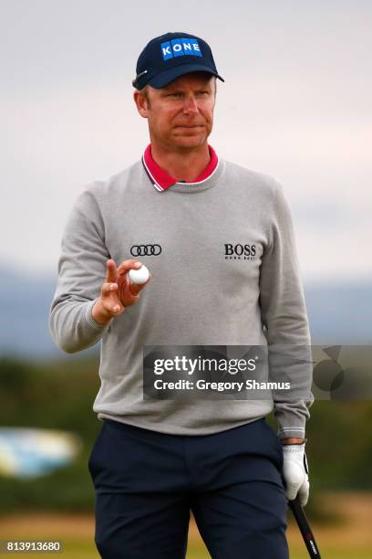 Mikko Ilonen of Finland acknowledges the crowd on the 7th green during day one of the AAM Scottish Open at Dundonald Links Golf Course on July 13,...