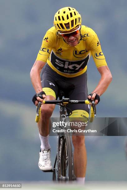 Christopher Froome of Great Britain riding for Team Sky in the yellow leader's jersey crosses the finish line during stage 12 of the 2017 Le Tour de...