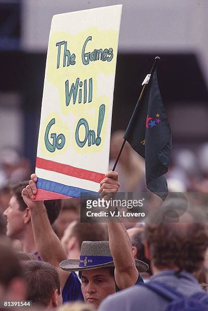 Terrorist Bombing: 1996 Summer Olympics, View of THE GAMES WILL GO ON sign at reopening of Centennial Olympic Park after bomb explosion, Atlanta, GA...